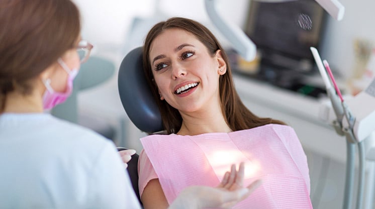 woman sitting in dental chair